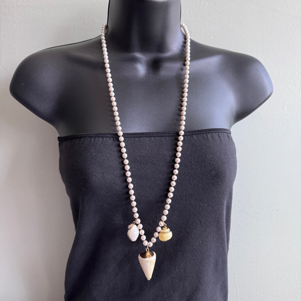 Elegant Pearl Necklace with Shell Charms